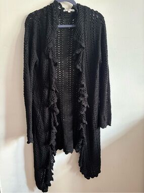 Les Petits Black crochet cardigan with ruffles and lace detailing